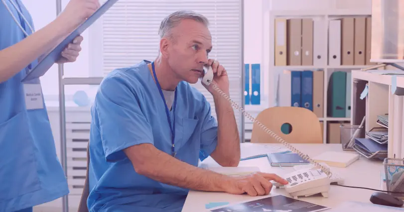 medical practitioner on the phone