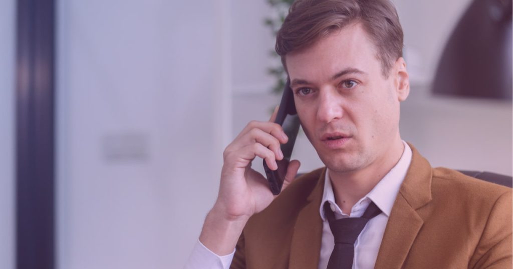 business representative on the phone with a client